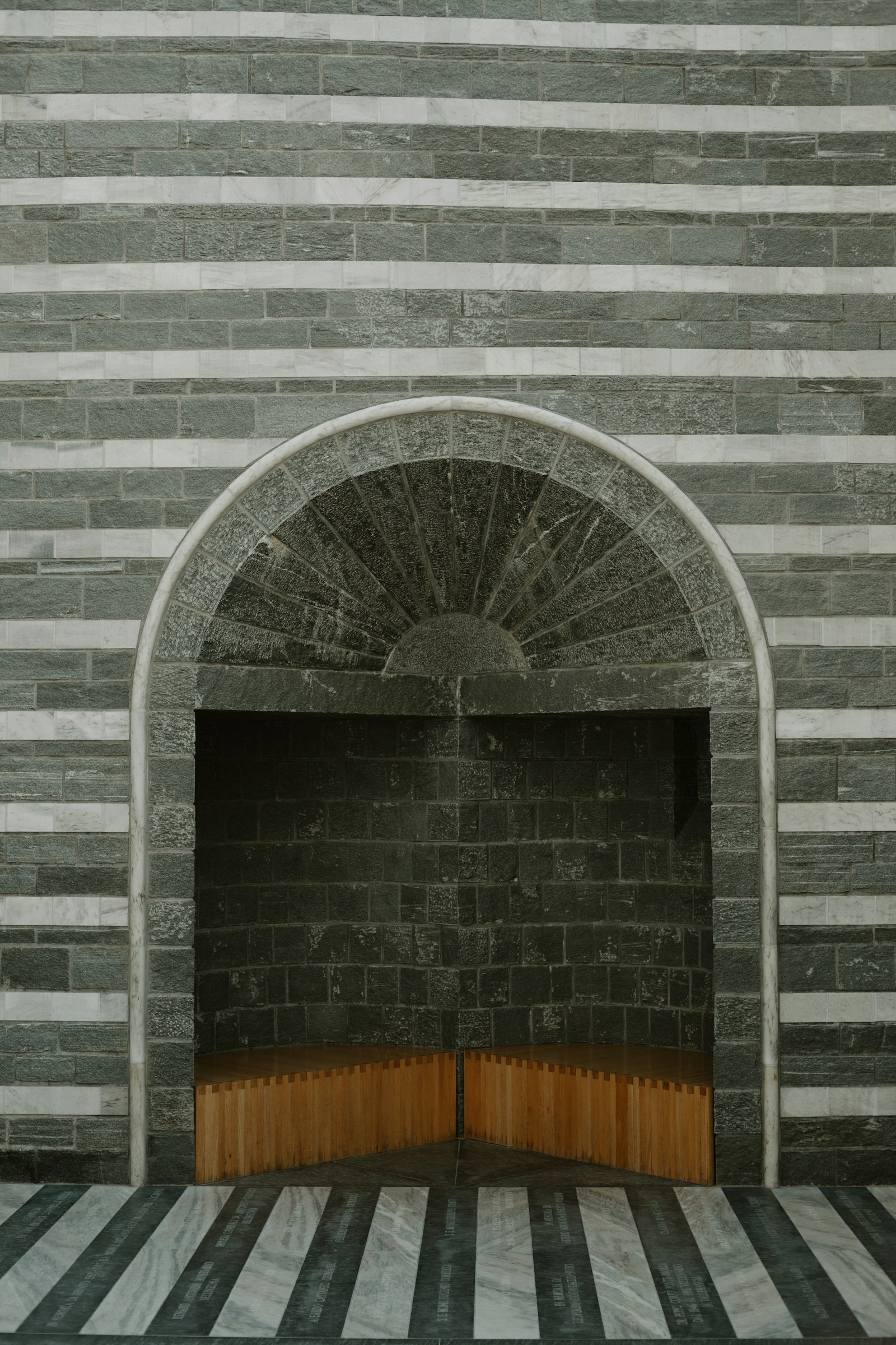 Hand-laid brick archway with detailed mortar work